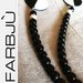 Collana di perle nere con elementi in cartoncino