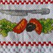 Asciughino cucina in spugna insalata e pomodori