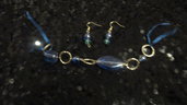 Set bracciale e orecchini con perle blu