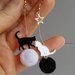 orecchini gatto pendenti pon pon bianco nero regalo gattara