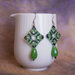 Orecchini verdi in tessitura di perline con monachella acciaio