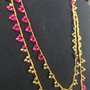 Collana handmade con cristalli oro e fucsia 