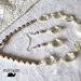                                                             parure: collana e orecchini perle e cristalli