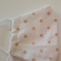 Mascherina bianca con pois beige