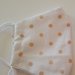 Mascherina bianca con pois beige