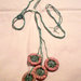 collana verde con ciondoli 4 anelli (n°558)