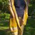 Sciarpa stola con inserti e tasche all'uncinetto lana merino giallo senape 