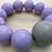 Bracciale elastico con perle color lilla