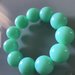 Bracciale elastico con perle verde acqua 