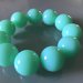 Bracciale elastico con perle verde acqua 