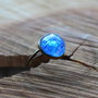 anello iridescente azzurro