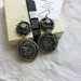 Kéyam Apé  Orecchini pendenti nero,acciaio e argento, lavorati a bead embroidery