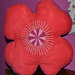 Cojin flor rojo