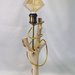 Lampada artigianale in legno con decoro in ottone