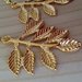 Orecchini Kate Middleton oro fiori foglie regalo minimal eleganti pendenti 