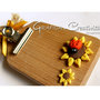 Tagliere in legno con girasoli e coccinella