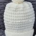Cappello in lana merinos 100% con pom pom lavorato a mano