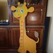 Giraffa metro su legno