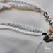 Braccialetti bianco e argento con charms ed elemento centrale con perle e strass