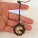Klimt collana girocollo con ciondolo a cerchio, immagine dedicata alla maternità di klimt e perlina bianca