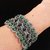 Bracciale celtico al chiacchierino nei toni del verde scuro con filo metallizzato e cristalli in tinta