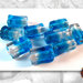 100 Perle vetro - rettangolo bicolore - 8x15 mm - Colore: Azzurro - Trasparente