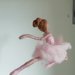 Ballerina in lana cardata