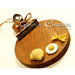 Piccolo tagliere con decorazione: coccinella, uovo, biscotti
