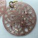 Orecchini pendenti in resina trasparente rosa cipria con  glitter ton sul ton e stelline color rame e multicolor 