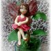 Collezione Bambole - Natale - fatina rossa e fiore in porcellana fredda