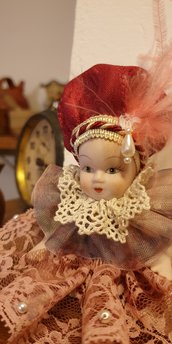 Bambola porcellana materiali preziosi 