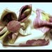 Pochette viola con fiore