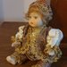 Bambola porcellana maschietto materiali preziosi