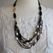 collana perle di fiume asimmetrica multifilo con mezzi cristalli e perle vetro di Boemia