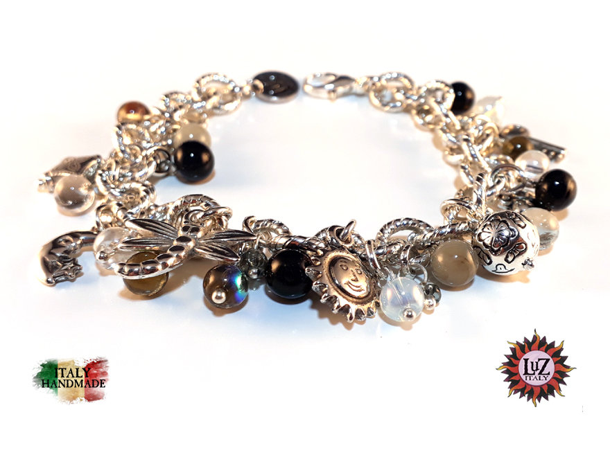 Bracciale di corda con pendente charm in argento Cinemania, fatto a