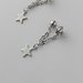 Orecchini pendenti in acciaio con catenina e ciondolo a forma di stella con chiusura a perla