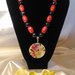 Collana con perle in ceramica