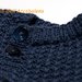 Cardigan asimmetrico di colore blu avio con bordo a coste doppie e motivo a quadretti in lana merinos