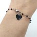 Bracciale stile rosario in acciaio realizzato a mano, cristalli neri e ciondolo cuore nero.