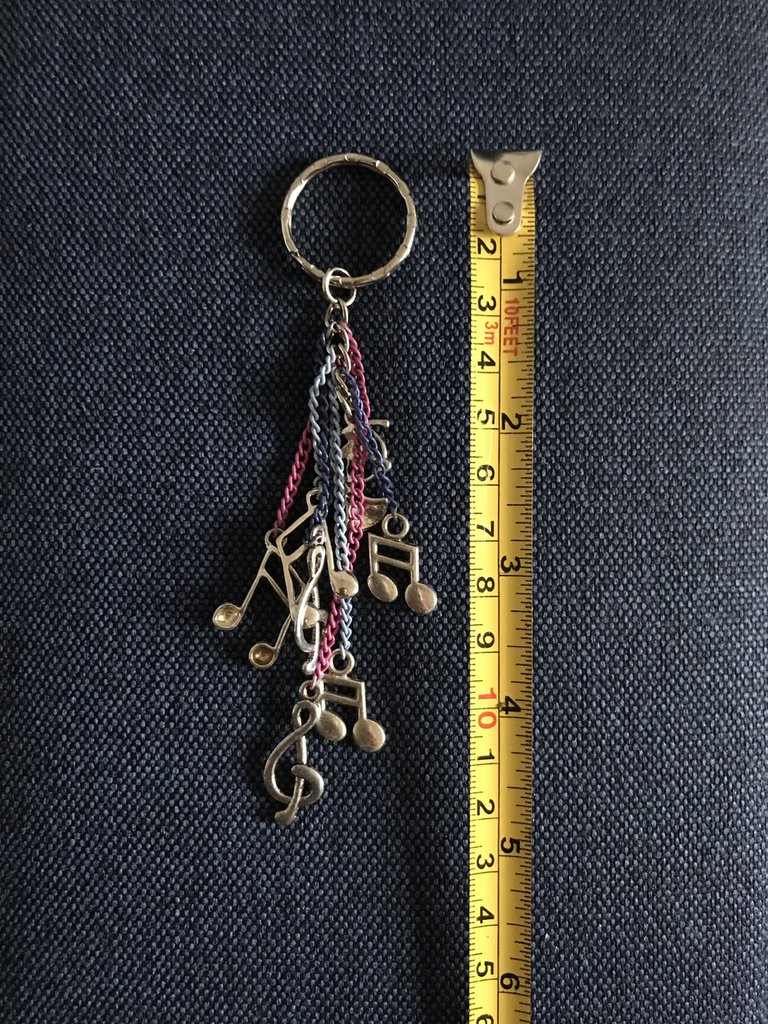 A PAIR TIBETAN SILVER MUSICAL NOTE THEMED DANGLY CLIP ON EARRINGS. NEW