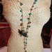 Collana lunga realizzata a mano all'uncinetto (crochet) con filo lurex e cristalli.