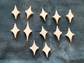 set  12 pezzi in legno a forma di aquilone o stella stilizzata