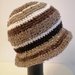 Cappello lana marrone a righe