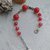 Bracciale con pietre rosse