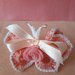 Farfallina chiudisacchettino 🎀 rosa e profili bianchi, con rosellina e nastrino rosa. 