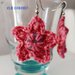 Orecchini crochet stella rosa