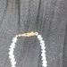 Collana con pietre dure mezzi cristalli celeste chiaro molto delicato e chiusura con moschettone dorato, lunga circa 45cm. 