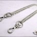Catena per borsa, diamantata colore argento lunga cm. 130, completa di anelli, moschettoni  e ciondoli cuore