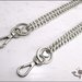 Catena per borsa, diamantata colore argento lunga cm. 115, completa di anelli, moschettoni  e ciondoli cuore.