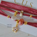 Bracciale multigiro in cotone rosso rubino, charm oro, con iniziale